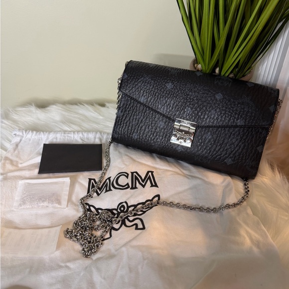 MCM Handbags - MCM Black Textured Clutch with Silver Chain